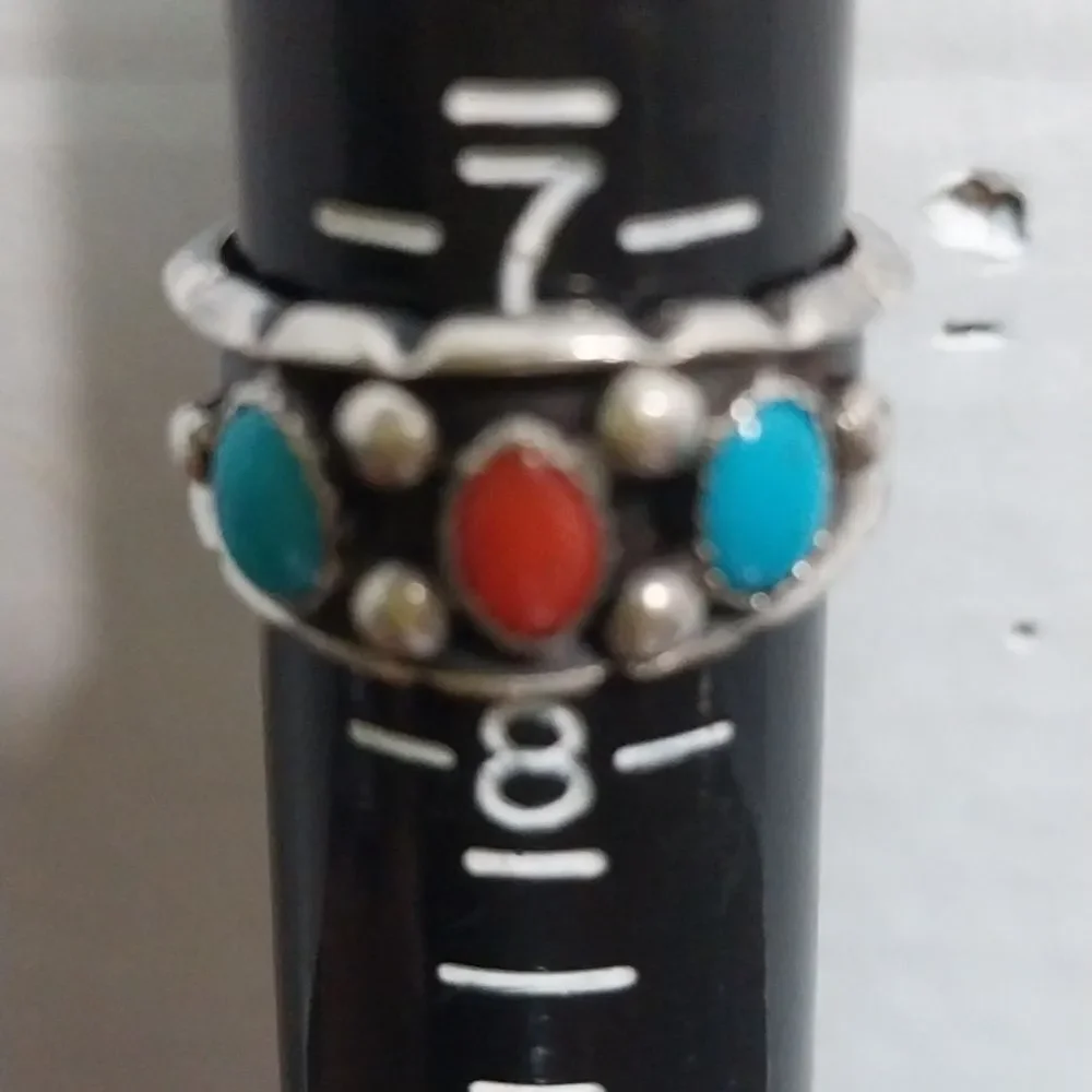 Sterling Silver Ring with Turquoise and Coral Accents.  It Is Signed E and L.